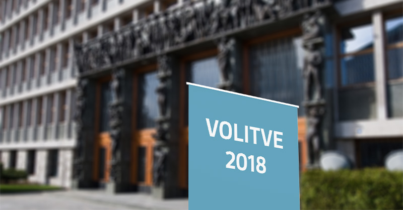 Napis Volitve 2018 pred stavbo državnega zbora